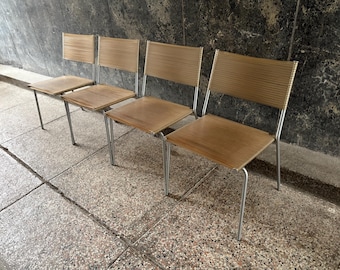 1 van 4 Miss B eetkamerstoelen van Tito Agnoli voor Bonacina, vintage stapelbaar uit de jaren 90