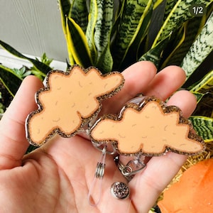 Dino Nuggets Badge Reel