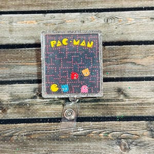 Vintage Video Game Shaker Badge Reel