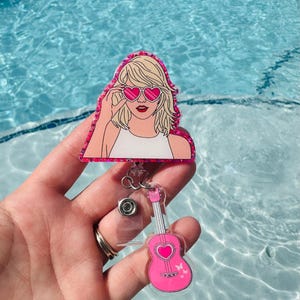 Singer Badge Reel With Charm