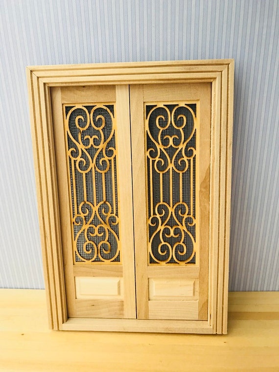 unpainted wooden dolls house