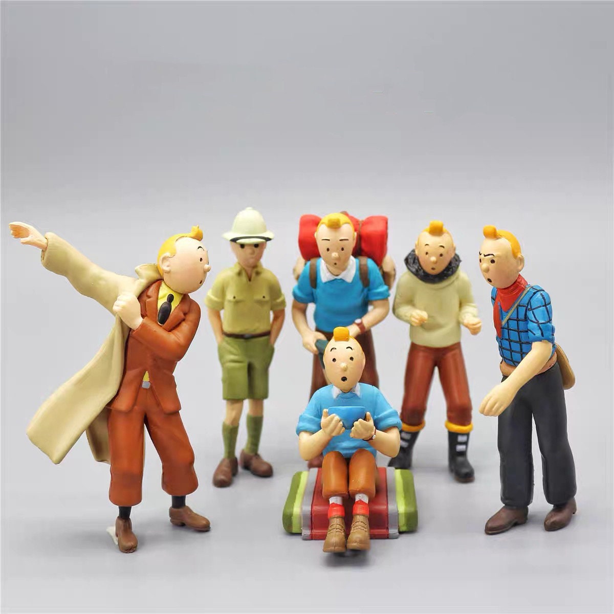 Tintin - Figurine PVC Moulinsart (Atlas) - Tintin portant Milou sur son dos
