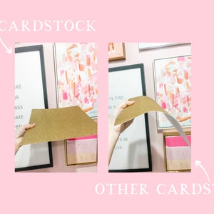 May include: Two pieces of gold glitter cardstock. One piece is flat and the other is bent to show its flexibility. The cardstock is being held by a person's hand in front of a wall with framed artwork.