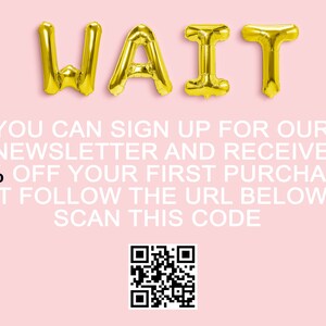 May include: A pink background with the word "WAIT" in gold foil letters. The text below reads "You can sign up for our newsletter and receive 15% off your first purchase. Just follow the URL below or scan this code." A QR code is displayed below the text.