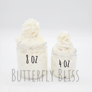 May include: Two jars of white body butter, one labeled "8 oz Butterfly Bliss" and the other labeled "4 oz Butterfly Bliss".