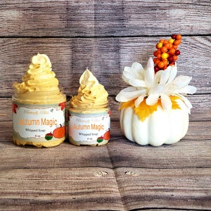 May include: Two jars of whipped soap with a fall theme. The jars are labeled "Autumn Magic" and are decorated with a pumpkin and fall leaves. The larger jar is 8 oz and the smaller jar is 4 oz.