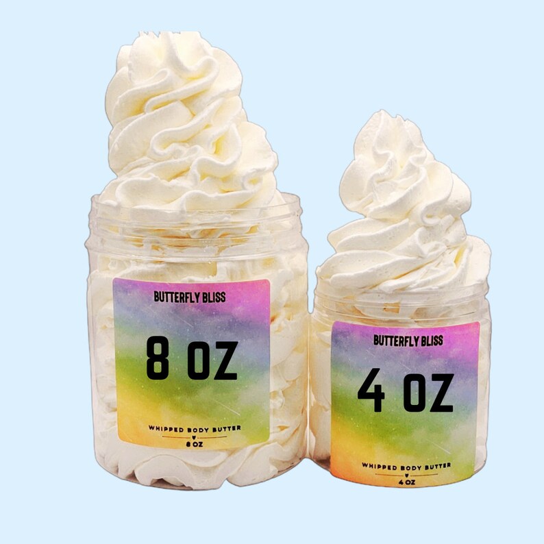 May include: Two jars of whipped body butter, one 8 ounce and one 4 ounce, both with a rainbow gradient label that says "Butterfly Bliss" and "Whipped Body Butter".