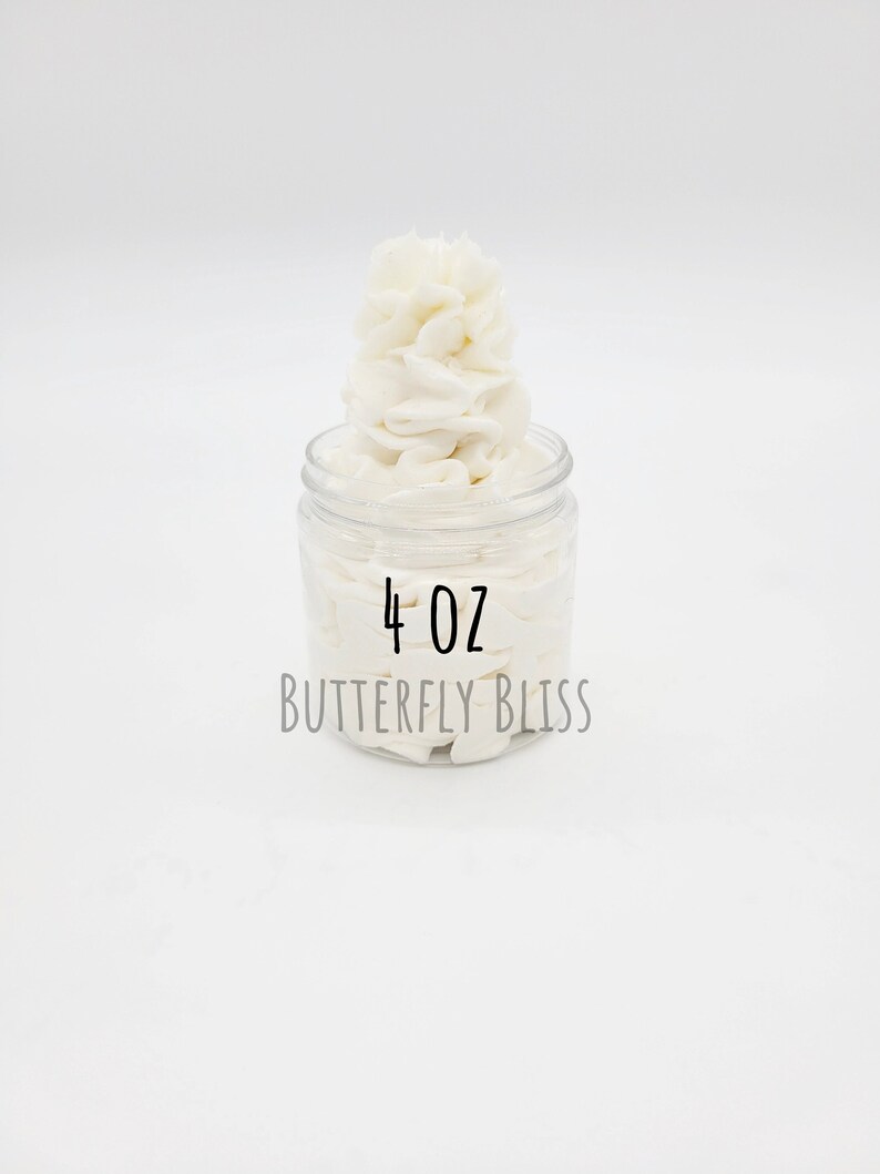 May include: A clear glass jar filled with white whipped body butter. The jar has a label that reads "4 oz BUTTERFLY BLISS".