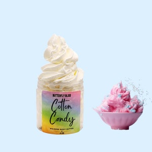 May include: A jar of whipped body butter with a rainbow gradient label that reads "Butterfly Bliss Cotton Candy Whipped Body Butter 4 oz". The jar is filled with a white whipped cream-like product. A pink whipped cream-like product is shown in a pink bowl.