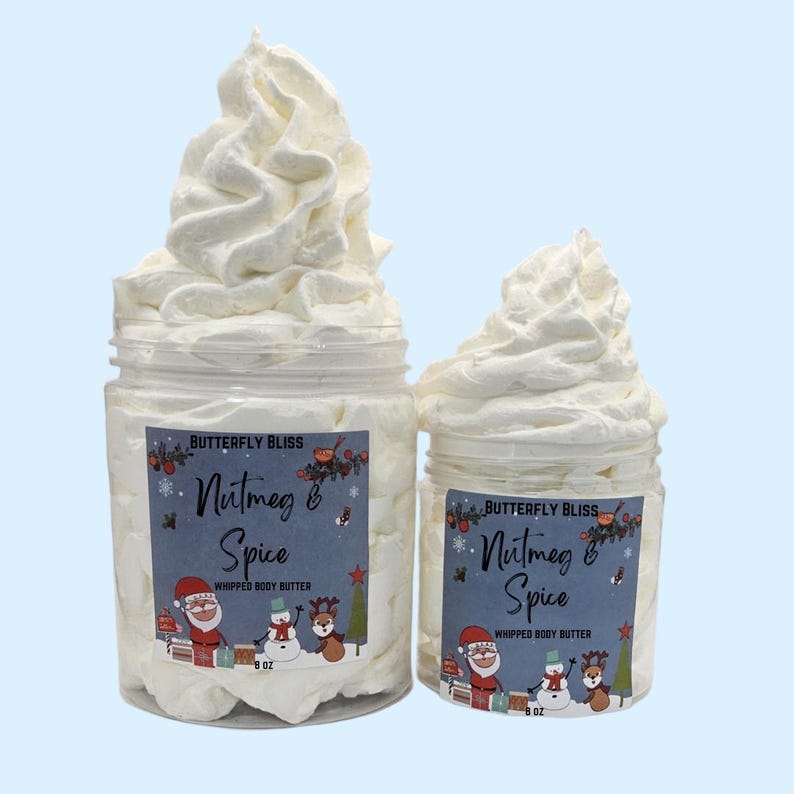 May include: Two jars of whipped body butter, both labeled "Butterfly Bliss Nutmeg & Spice Whipped Body Butter". The larger jar is 8 ounces and the smaller jar is 4 ounces.