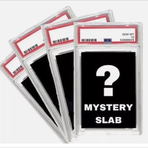 May include: Several graded card slabs in clear plastic cases, each with a red and white label. One slab displays a white question mark on a black background, with the words "MYSTERY SLAB".