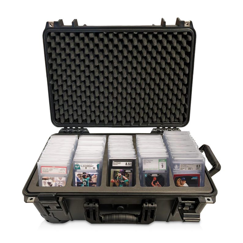 May include: Black hard-shell case with foam interior for storing and transporting trading cards. The case is open and shows rows of trading cards in protective plastic sleeves.