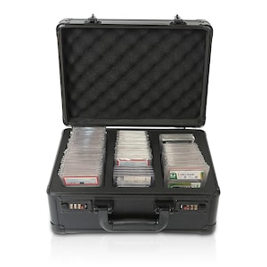 May include: Black aluminum case with a combination lock, designed to hold and protect trading cards. The case is open and filled with rows of cards in protective sleeves.