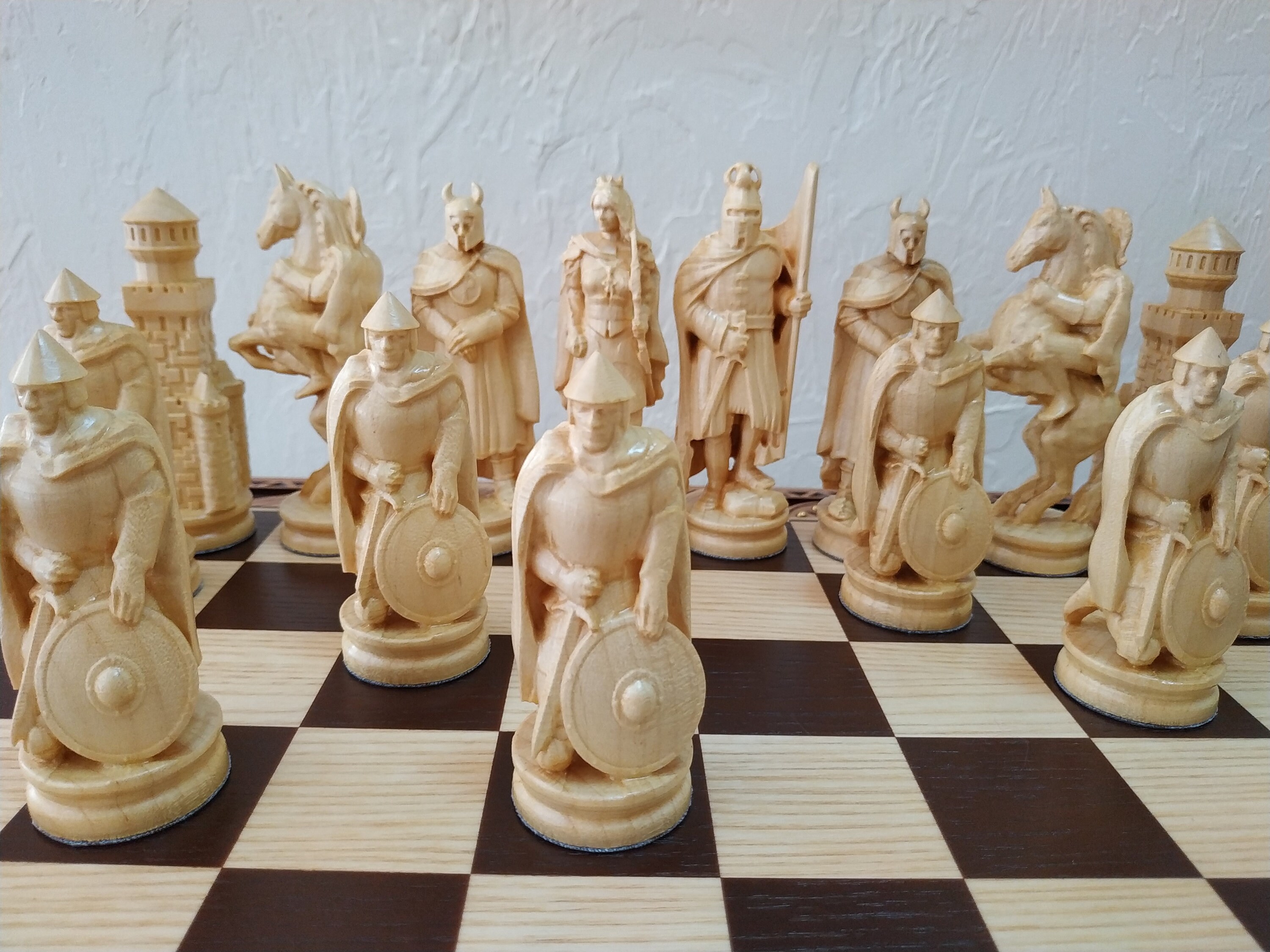 Hand-carved chess set — not sure what the pieces are made of, maybe ivory?  looking for cleaning tips! : r/CleaningTips