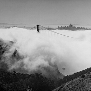 Black and white photograph of the Golden Gate Bridge sinking into fog, shot on 4x5 film