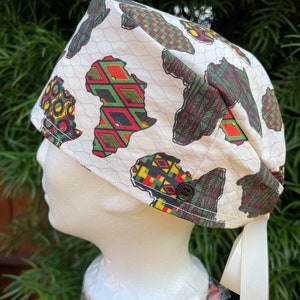 African wakanda forever vibes scrub cap with buttons. Unity, proud, liberate