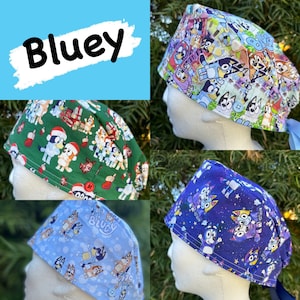 May include: Four different patterned surgical caps featuring characters from the children's show "Bluey". The caps are in green, blue, light blue, and purple.