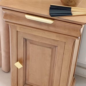 Vintage solid wood storage unit. Rustic bedside table with drawer and door. Country chic decor.
