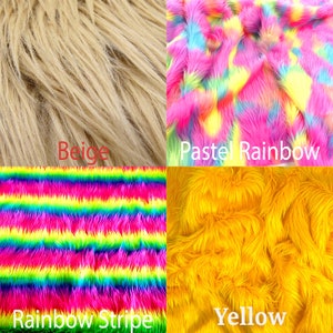 May include: A collage of four faux fur fabric swatches. The top left is beige, the top right is a pastel rainbow pattern, the bottom left features horizontal rainbow stripes, and the bottom right is a solid yellow. Each section includes text labels.