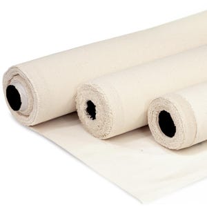 May include: Three rolls of off-white, heavy-duty canvas fabric arranged side by side. Each roll features a tightly wound, textured weave with visible frayed edges at the ends and a hollow black cylindrical core running through the center.