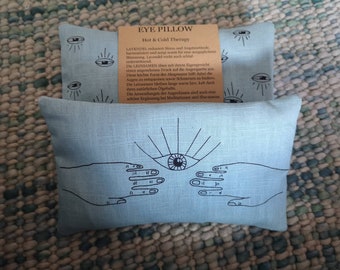 Light blue eye cushion with organic lavender and flaxseed filling and beautiful screen print