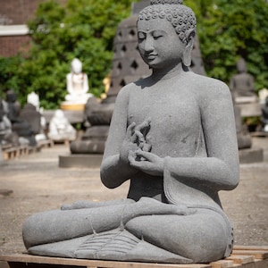 Newly made lavastone Buddha statue from Indonesia