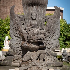 Large old lavastone Vishnu statue on Garuda bird from Indonesia