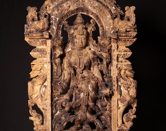 Large old teakwooden panel of the goddess Lakshmi from India