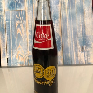 10 oz. unopened bottle of Coca Cola - Coke Commemorating the 30th Anniversary of WDEF -TV Channel 12 in Chattanooga, Tn
