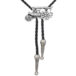 May include: A black bolo tie with a silver-toned charm of a vintage steam engine. The bolo tie has two silver-toned tips.