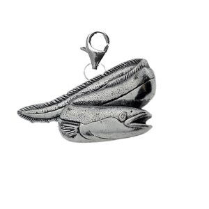 May include: A silver charm in the shape of a moray eel. The eel is curled up with its tail tucked under its body. The charm has a lobster clasp.