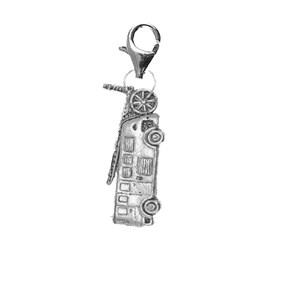 May include: Silver charm in the shape of a fire truck with a ladder extended. The charm has a silver clip on the top.
