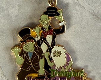 Vintage 1990’s, Disneyland Haunted Mansion Attraction Keychain, with Hitchhiking Ghosts Cloisonné Brass Fob