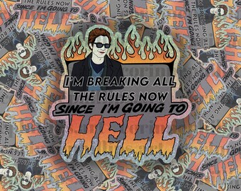 Op de afbeelding: Een sticker met een glinsterende afwerking met een man met donker haar en een zonnebril. De sticker heeft een vurige oranje en gele achtergrond met de tekst "Ik breek alle regels nu, want ik ga naar de hel".