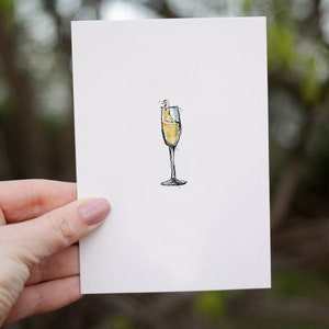 Biglietto d'auguri con champagne