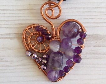 Purple Heart amethyst and copper pendant, complete with neck-cord