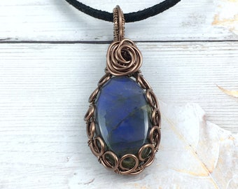 Blue flash labradorite wire wrapped pendant, complete with neck cord