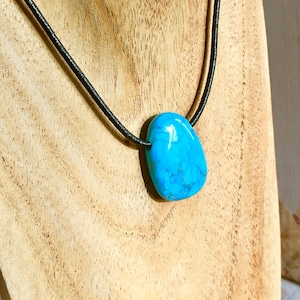 Crystal unisex pendants complete with neck cord, clear quartz, rose quartz, amethyst, turquoise howlite
