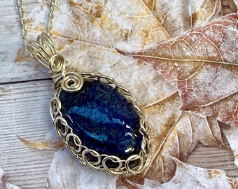 Lapis lazuli crystal pendant, wrapped in sterling silver, complete with black neck cord or silver chain