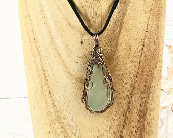 English seaglass wrapped in gunmetal enamelled copper wire, complete with neck cord