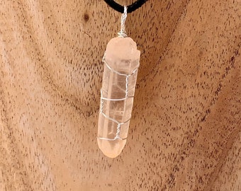 Silver wire wrapped Madagascan quartz pendant with neck cord