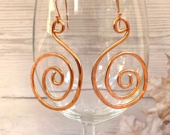 Hand forged copper swirl drop earrings