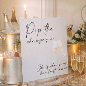Pop The Champagne She's Changing Her Last Name Acrylic Wedding Sign, Cocktail Bar Bubbly Champagne Drinks Bridal Shower Sign