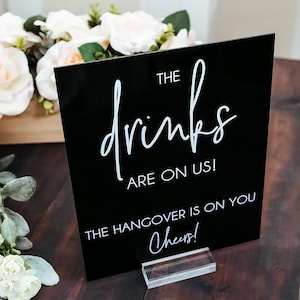 The Drinks Are On Us, The Hangover Is On You Clear Glass Look Acrylic Wedding Sign, Drink Coolers Favors Lucite Table
