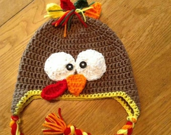 Gorro de pavo muy lindo, hecho a mano.