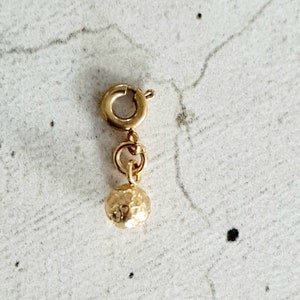 Gold-tone stainless steel mini charms Boule