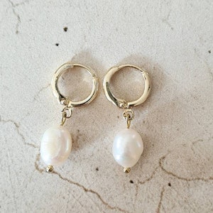 Mini gold stainless steel hoop earrings with mother-of-pearl beads