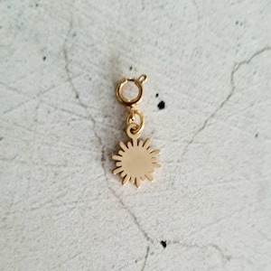 Gold-tone stainless steel mini charms Soleil