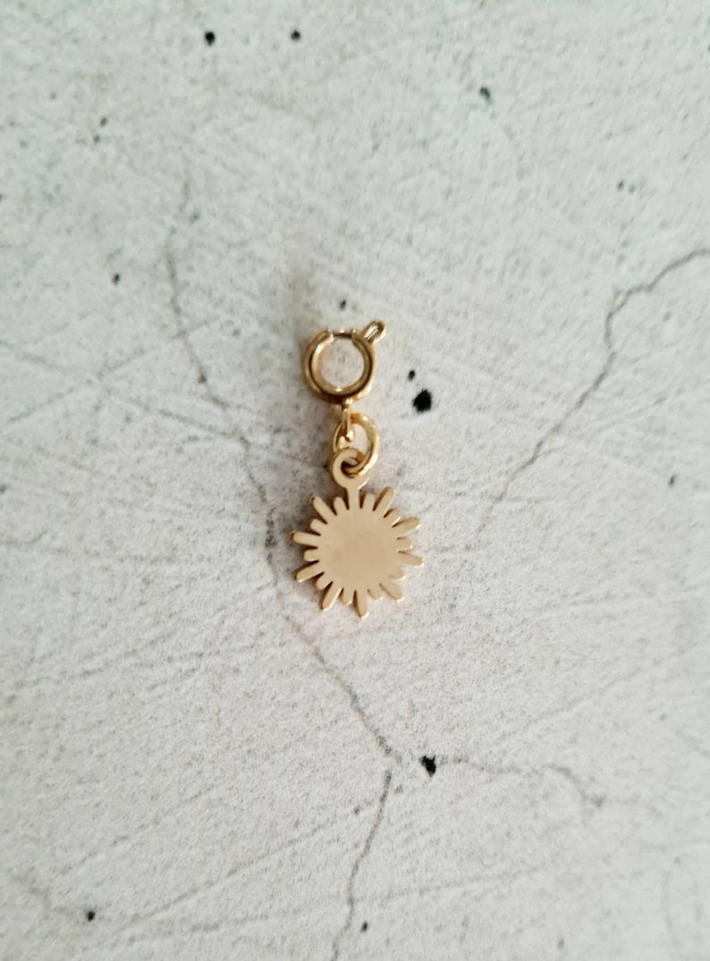 Gold-tone stainless steel mini charms Soleil