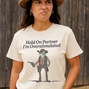 Hold On Partner I&#39;m Overstimulated Shirt | Funny Cowboy Neurodivergent Tee | Anxiety Humor Shirt | Sensory Overload Graphic T-Shirt